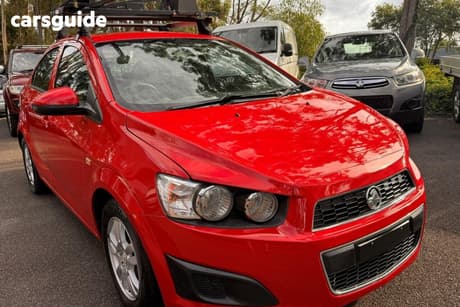 Red 2015 Holden Barina Sedan Cd