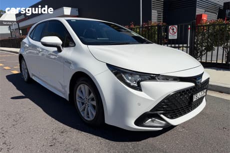 White 2023 Toyota Corolla Hatchback Ascent Sport Hybrid