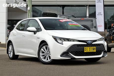 White 2023 Toyota Corolla Hatchback Ascent Sport Hybrid