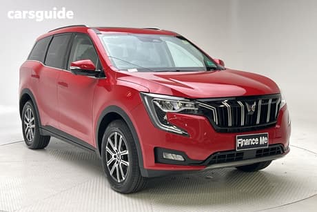 Red 2023 Mahindra XUV700 SUV