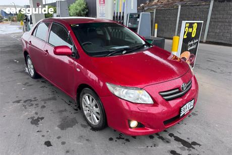 Red 2009 Toyota Corolla Sedan Ultima