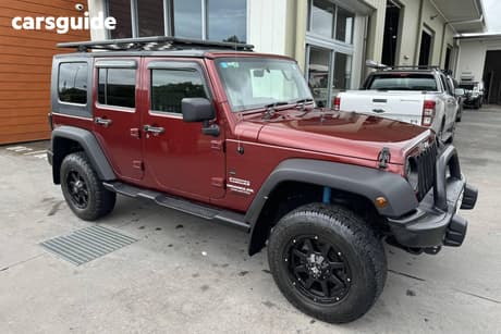 Red 2009 Jeep Wrangler Sedan UNLIMITED SPORT