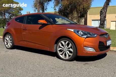 Orange 2013 Hyundai Veloster Coupe