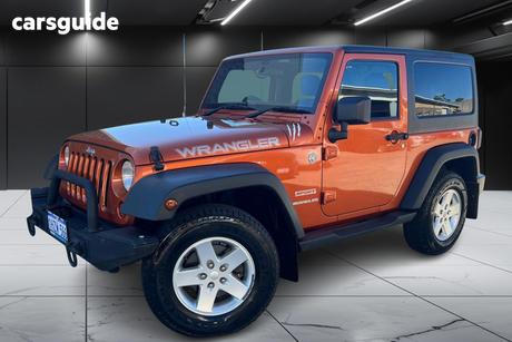 Orange 2012 Jeep Wrangler Softtop Sport (4X4)