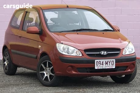Orange 2010 Hyundai Getz Hatchback S