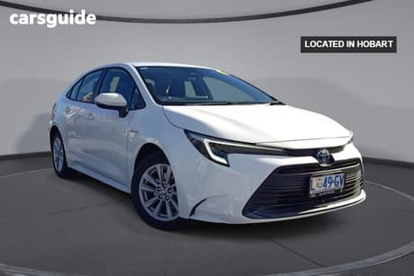 White 2023 Toyota Corolla Sedan Ascent Sport Hybrid