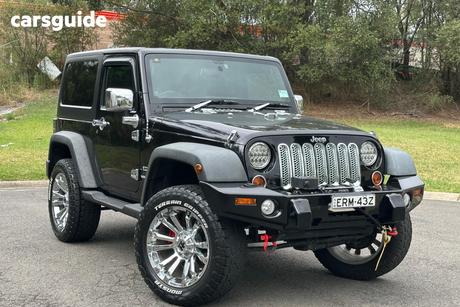 Black 2012 Jeep Wrangler Softtop Sport (4X4)