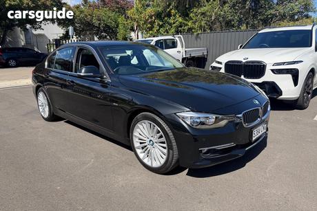 Black 2012 BMW 320I Sedan