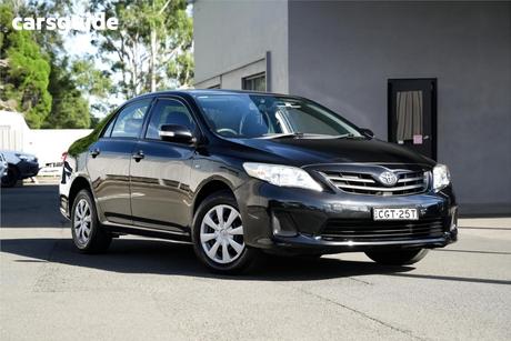 Black 2012 Toyota Corolla Sedan Ascent
