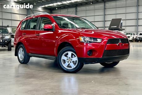 Red 2010 Mitsubishi Outlander Wagon Ls
