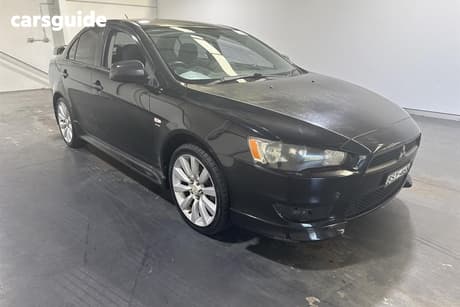 Black 2010 Mitsubishi Lancer Sedan Vr-X