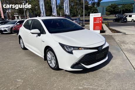 White 2023 Toyota Corolla Hatchback Ascent Sport Hybrid