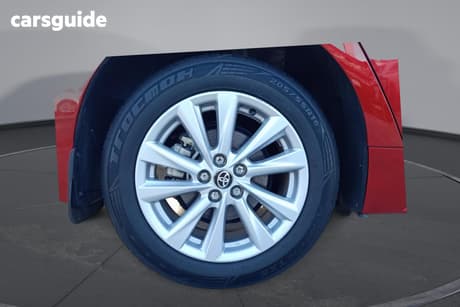 Red 2023 Toyota Corolla Hatchback Ascent Sport