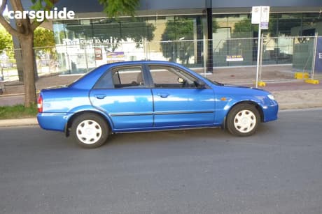 Blue 2002 Mazda 323 Sedan Protege