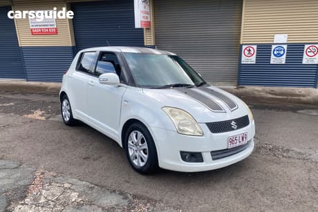 White 2010 Suzuki Swift Hatchback
