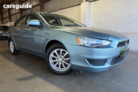 Blue 2011 Mitsubishi Lancer Sedan Sx