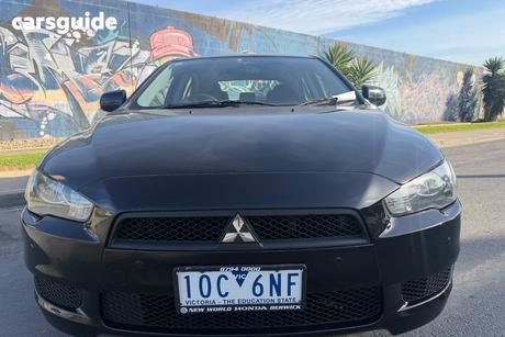 Black 2013 Mitsubishi Lancer Sedan Es