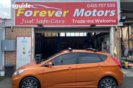 Orange 2015 Hyundai Accent Hatchback Active