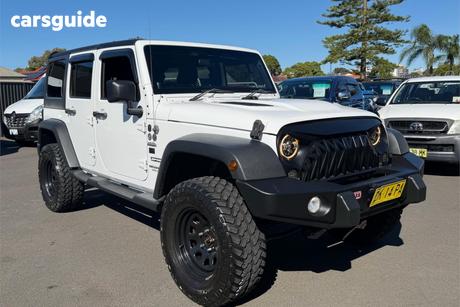 White 2012 Jeep Wrangler Softtop Unlimited Sport (4X4)
