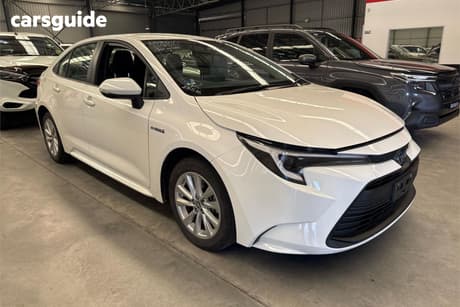 White 2024 Toyota Corolla Sedan Ascent Sport Hybrid