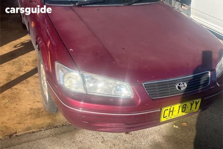 Red 1999 Toyota Vienta Sedan Grande