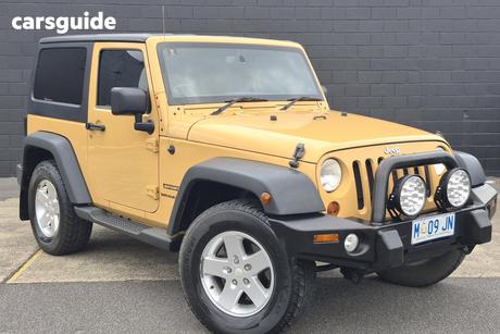 Beige 2014 Jeep Wrangler Softtop Sport (4X4)