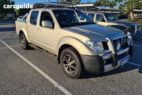 Yellow 2010 Nissan Navara Dual Cab Pick-up St (4X4)