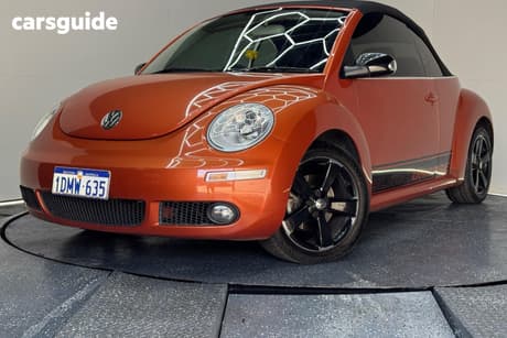 Red 2010 Volkswagen Beetle Cabriolet Cabriolet Blackorange