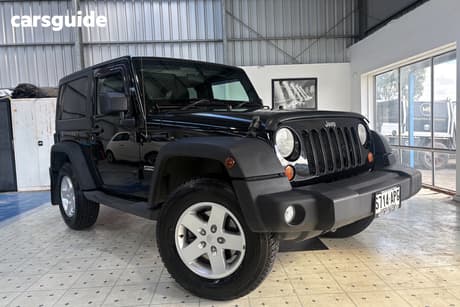 Black 2012 Jeep Wrangler Softtop Sport (4X4)