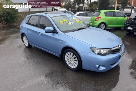 Blue 2011 Subaru Impreza Hatchback R (Awd)
