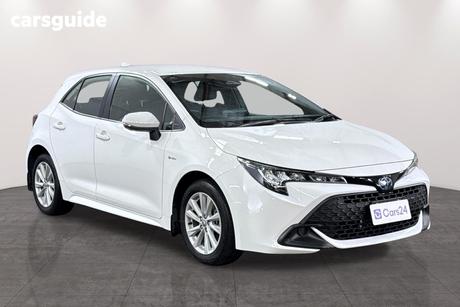 White 2024 Toyota Corolla Hatchback Ascent Sport + Conv Pk Hybrid