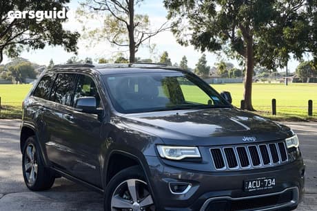 Grey 2015 Jeep Grand Cherokee SUV