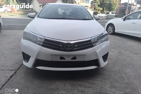 White 2015 Toyota Corolla Sedan Ascent