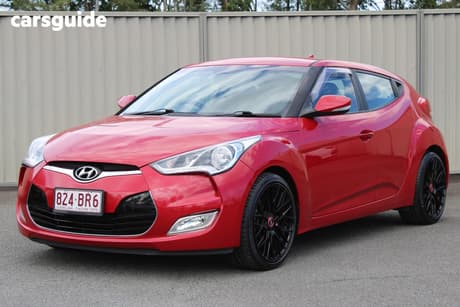 Red 2014 Hyundai Veloster Coupe +