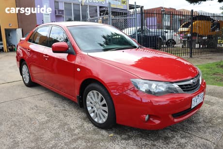 Red 2009 Subaru Impreza Sedan Rx (Awd)