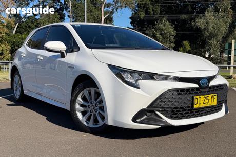 White 2024 Toyota Corolla Hatchback Ascent Sport Hybrid