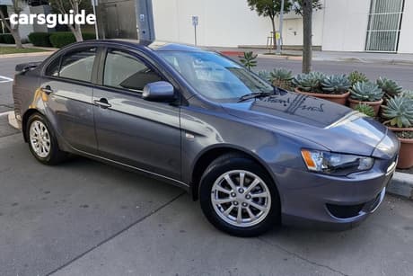 Grey 2011 Mitsubishi Lancer Sedan Sx