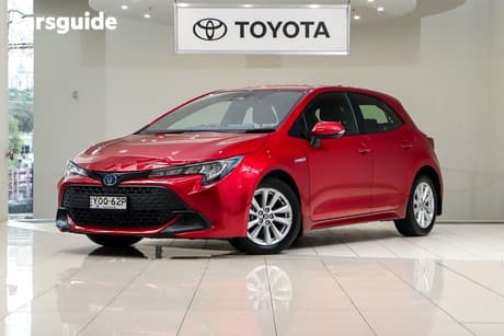 Red 2023 Toyota Corolla Hatchback Ascent Sport