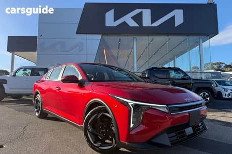 Red 2025 Kia K4 Sedan Sport+