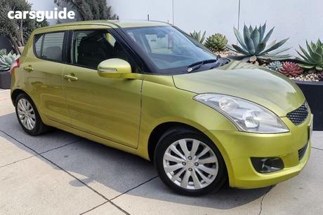Yellow 2013 Suzuki Swift Hatchback Glx