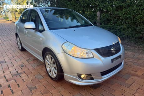 Silver 2011 Suzuki SX4 Sedan S