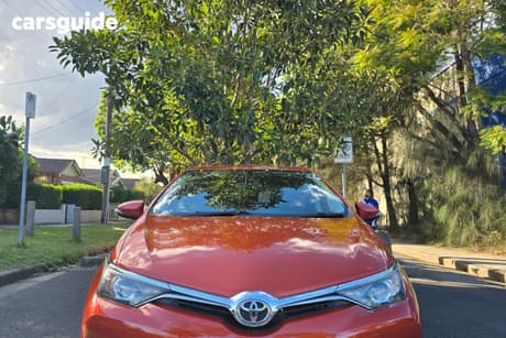 Orange 2016 Toyota Corolla Hatchback Ascent Sport