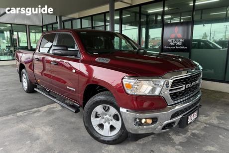 Red 2023 RAM 1500 Crew Cab Utility Big Horn (6-4 Tub) Mhev (4X4)