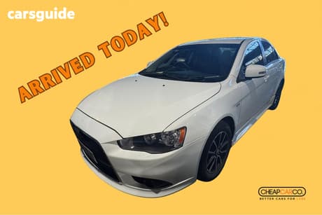White 2014 Mitsubishi Lancer Sedan Es Sport
