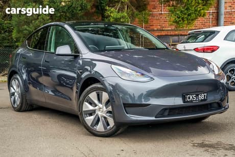 Silver 2023 Tesla Model Y Wagon Rear-Wheel Drive