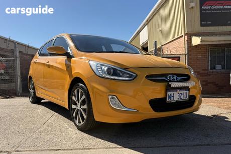 Yellow 2014 Hyundai Accent Hatchback Sr
