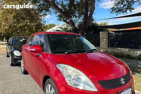Red 2014 Suzuki Swift Hatchback Gl