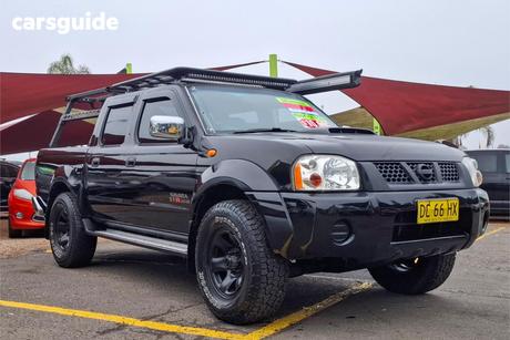 Black 2011 Nissan Navara Dual Cab Pick-up St-R (4X4)