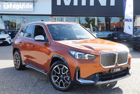 Orange 2024 BMW IX1 Wagon Xdrive30 Xline