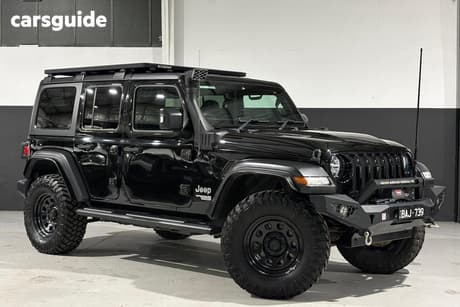 Black 2019 Jeep Wrangler Unlimited Softtop Sport S (4X4)